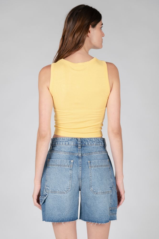 Women's yellow crop tank top with a sleek fitted design and effortless versatility.