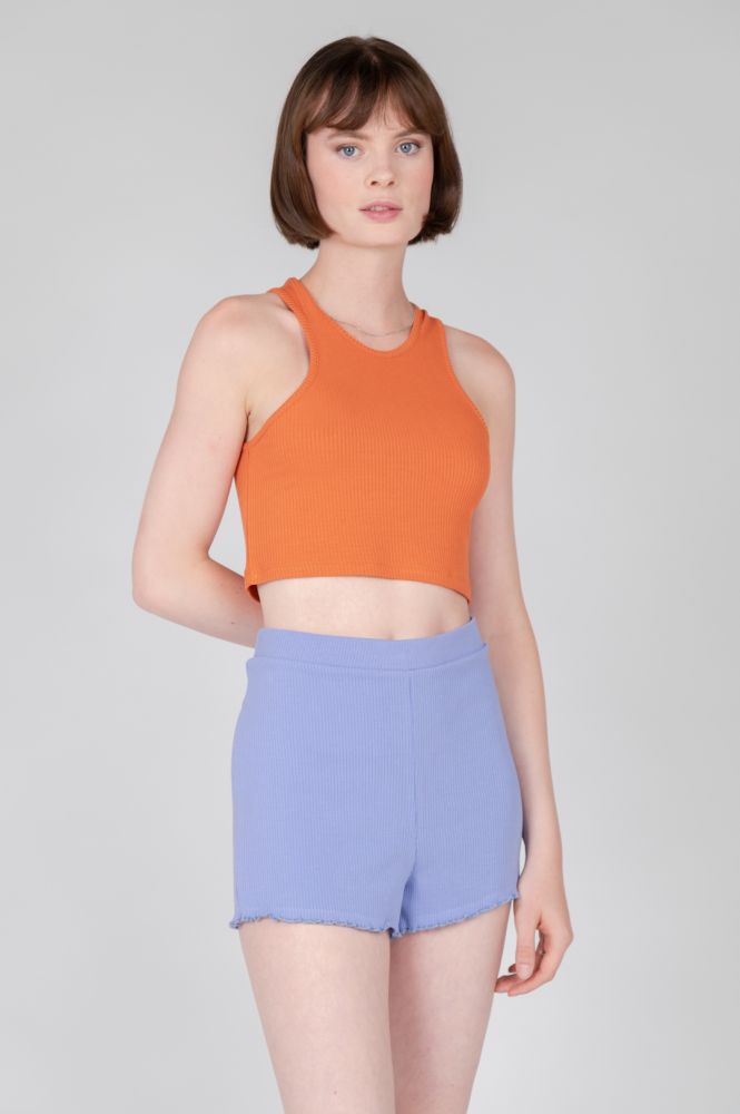 Trendy racerback crop top in vibrant orange perfect for summer outfits and vacations.