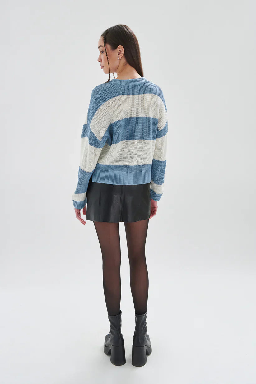 Casual striped pullover in soft blue and ivory featuring textured knit fabric and modern relaxed silhouette for daily wear.