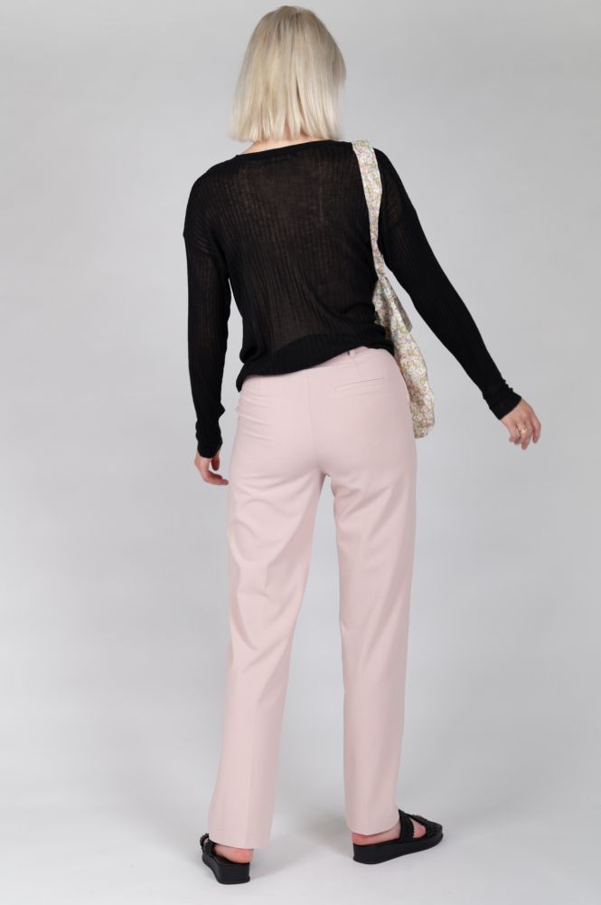 Chic black long sleeve knit top perfect for work, travel, and casual occasions.