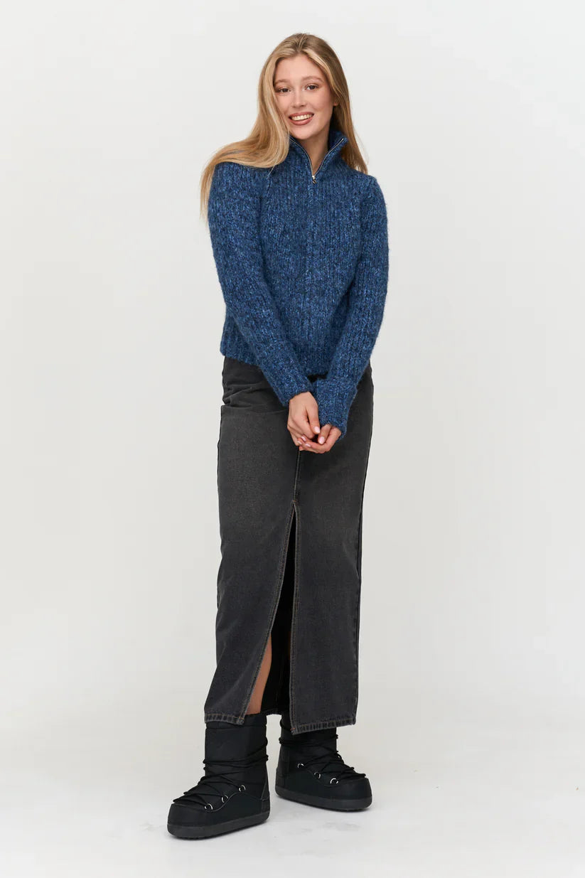 Fashion-forward women’s blue cardigan with oversized chunky knit look