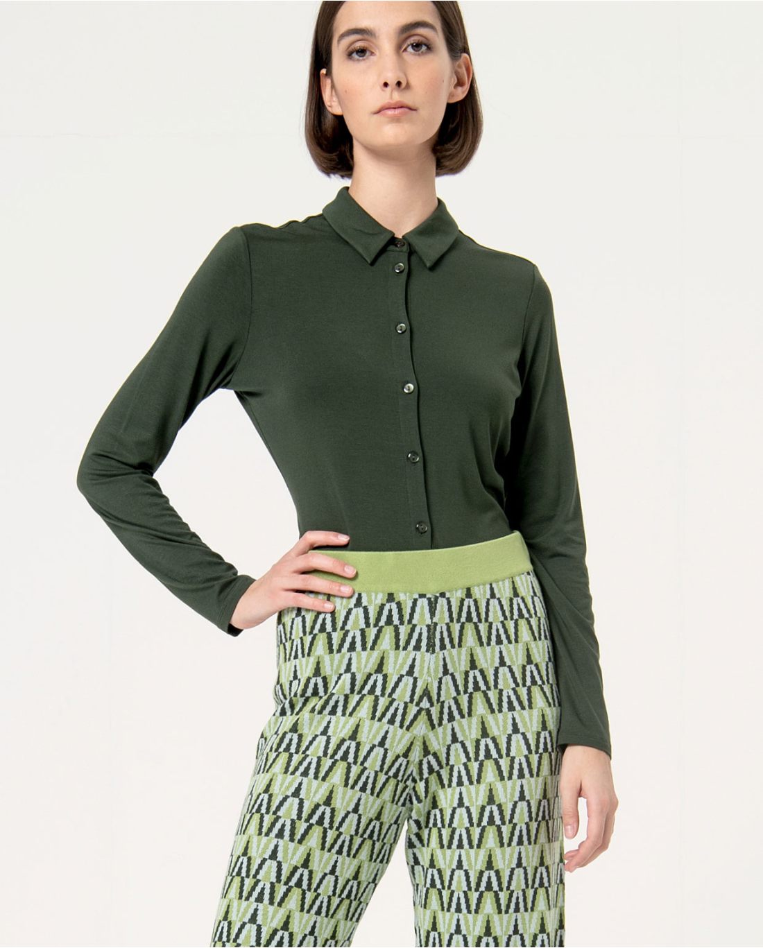 Women’s jacquard geometric pants with relaxed tailored silhouette and elevated statement fashion appeal.