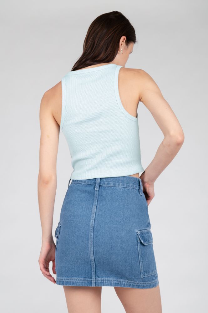 Light blue sleeveless top ideal for spring fashion, travel outfits, and weekend wear.