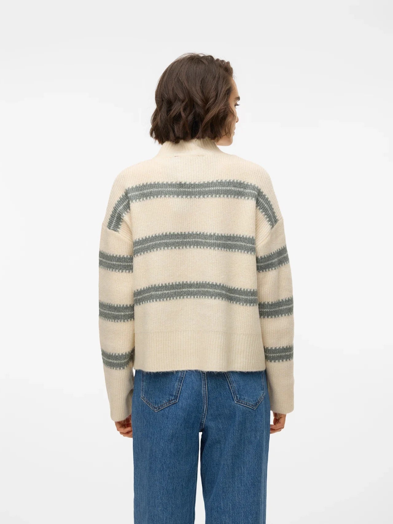Contemporary cream and grey striped sweater with relaxed fit and chic effortless boutique style.