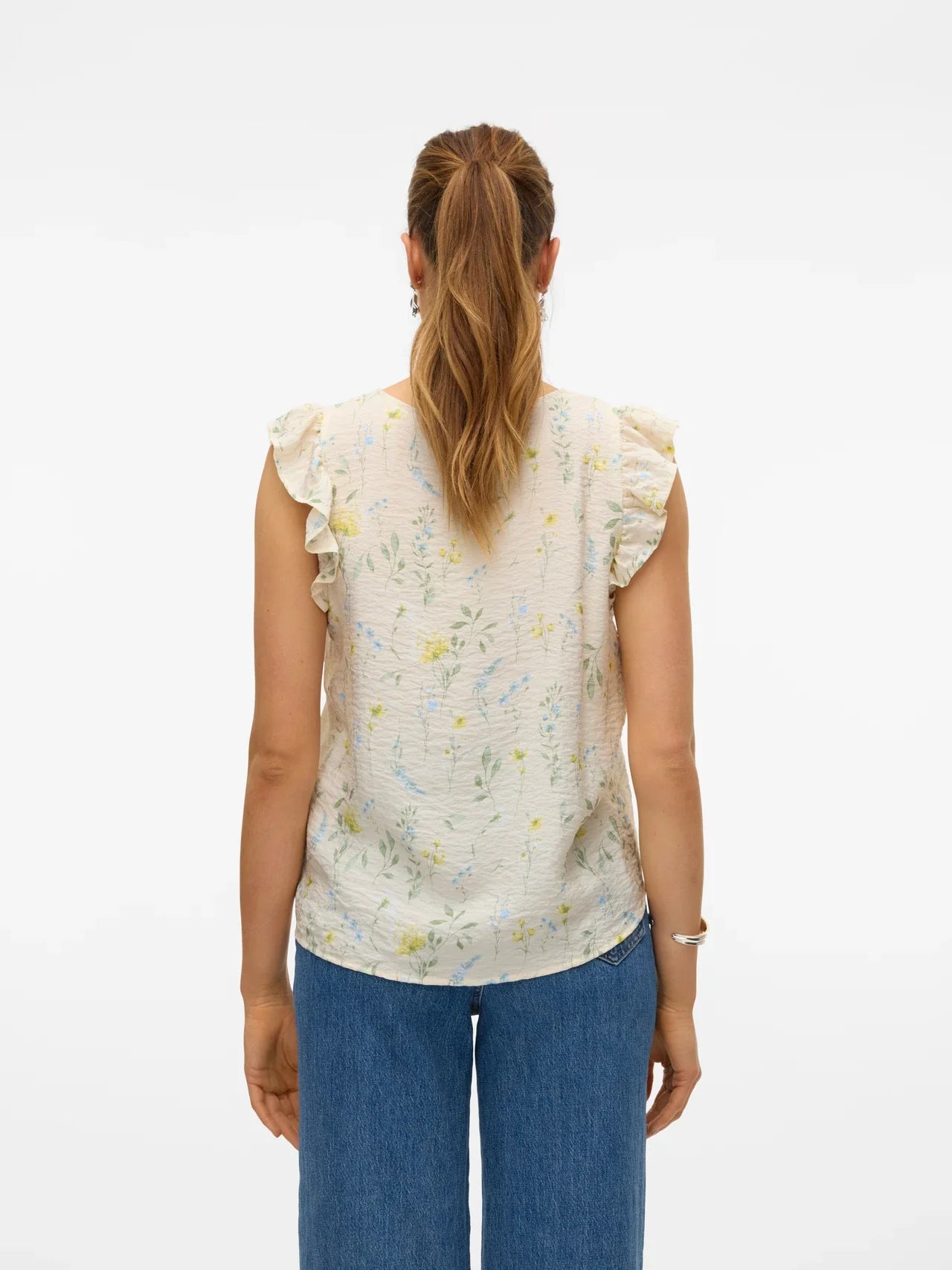 Cottagecore-inspired women’s floral tank top with delicate pastel flowers and relaxed elegant fit.