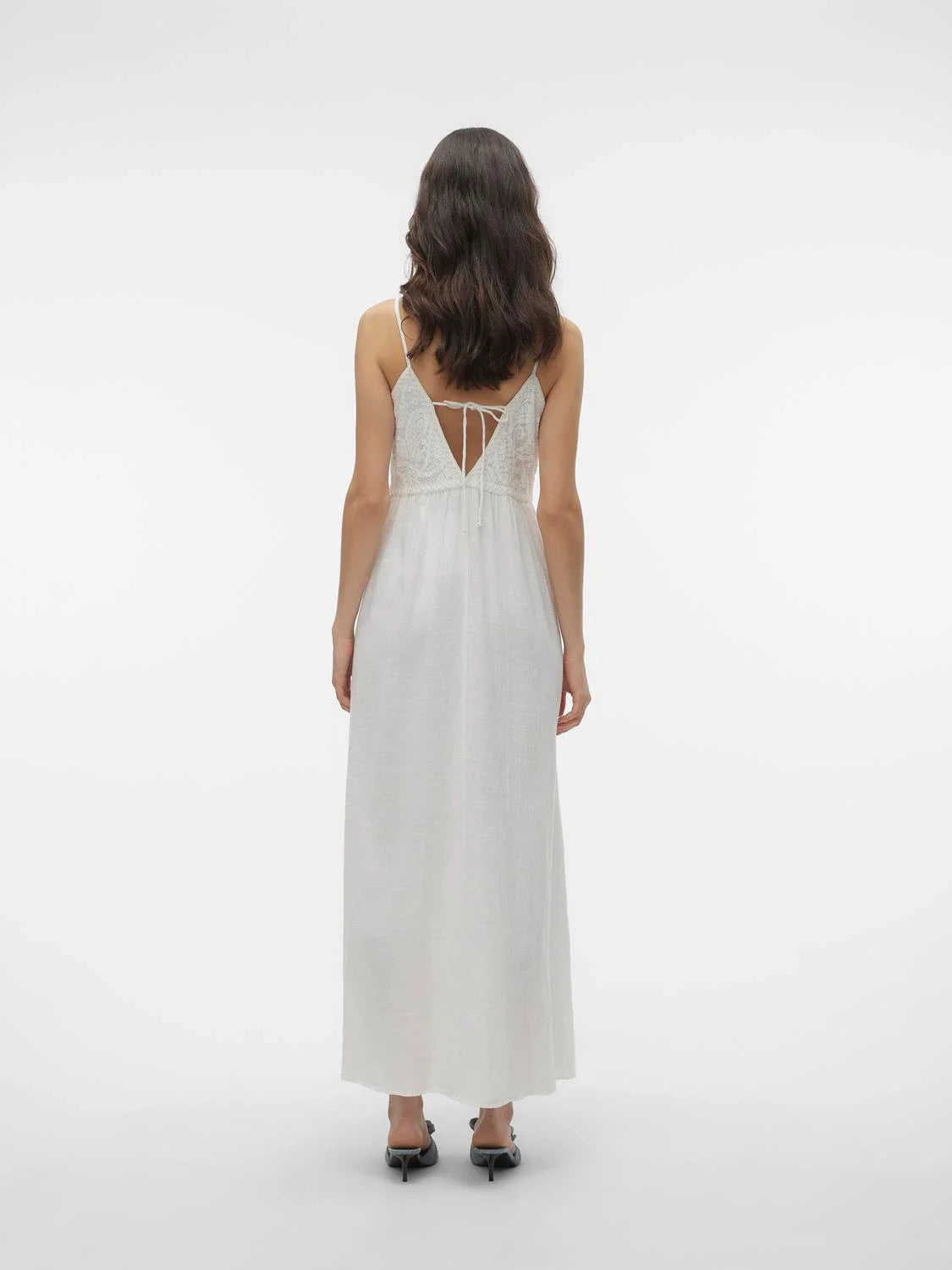 Lightweight white summer maxi dress with fitted lace bodice and relaxed bohemian elegance.