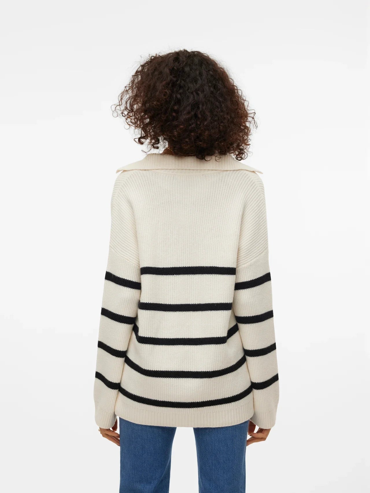Contemporary women’s collared striped sweater with modern oversized silhouette and timeless monochrome appeal.