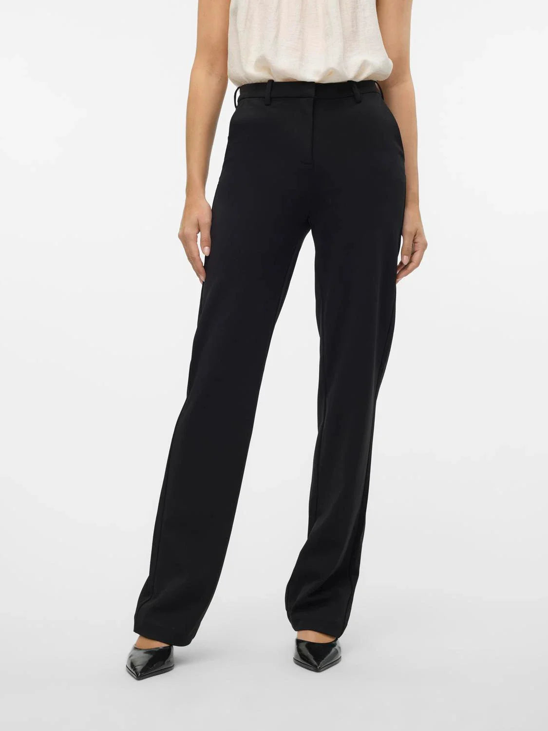 Chic black wide leg dress pants featuring high waist tailoring and sophisticated modern workwear aesthetic.