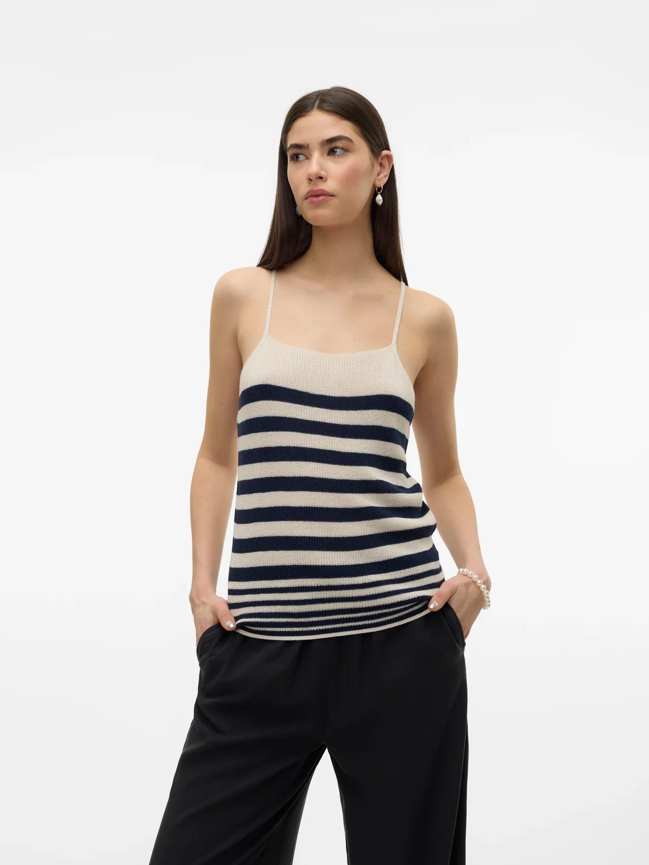 Casual luxe striped sweater cami in cream and navy with breathable knit construction for warm-weather dressing.