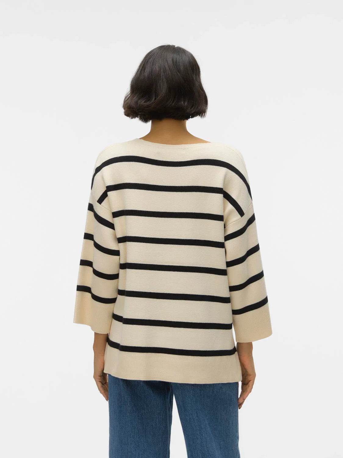 Women’s chic striped sweater featuring loose fit, neutral tones, and V-neckline for timeless capsule wardrobe essentials.