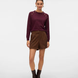 Women's deep plum crew neck sweater with decorative gold metallic buttons and long sleeves for a polished capsule wardrobe.