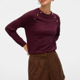 Women's elegant wine-colored long-sleeve sweater with statement gold buttons for polished smart casual styling.