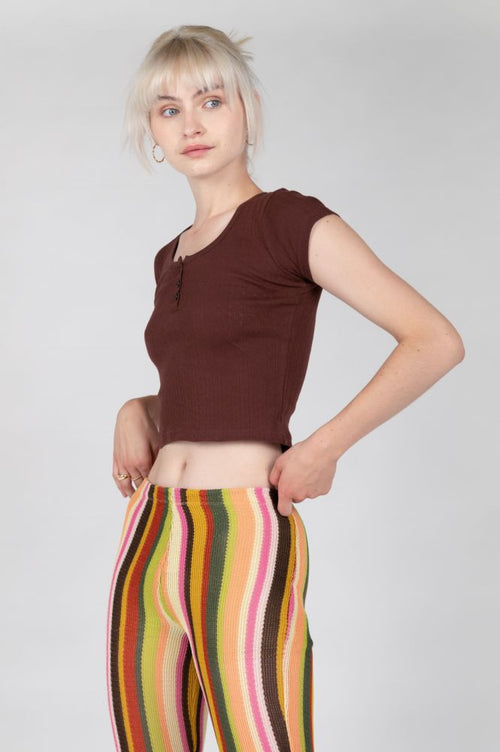 Trendy brown baby tee featuring button detail and soft stretch comfort.