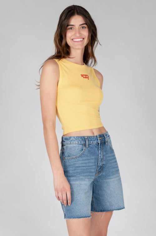 Essential sleeveless crop top perfect for casual outfits and warm-weather fashion.
