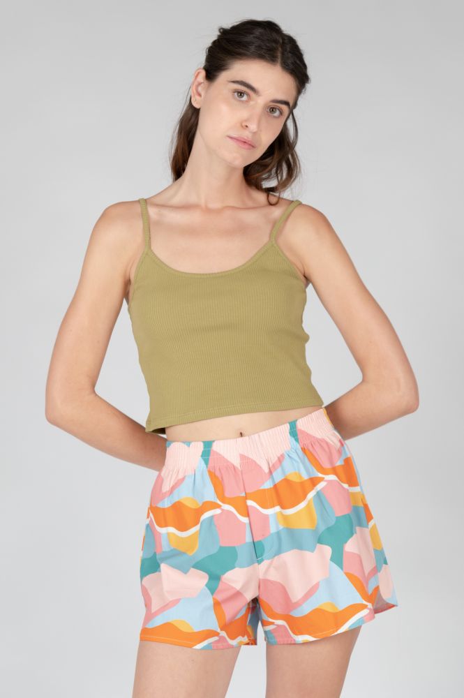 Comfortable ribbed cami featuring a sleek silhouette and versatile wardrobe appeal.