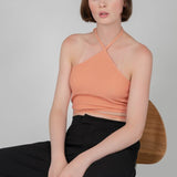 Trend-driven halter top perfect for summer events, vacations, and casual outings.