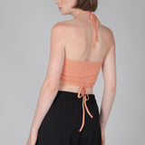Stylish halter blouse with open waist design perfect for vacation and resort wear.