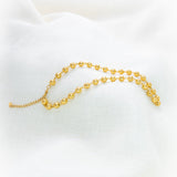 Elegantly draped Snappy, stainless steel necklace Viana Beads crafted like Portuguese filigree.