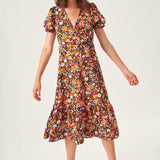 Elegant wildflower print midi dress with short sleeves and a timeless fit-and-flare inspired shape.