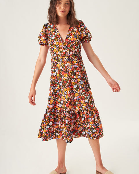 Elegant wildflower print midi dress with short sleeves and a timeless fit-and-flare inspired shape.