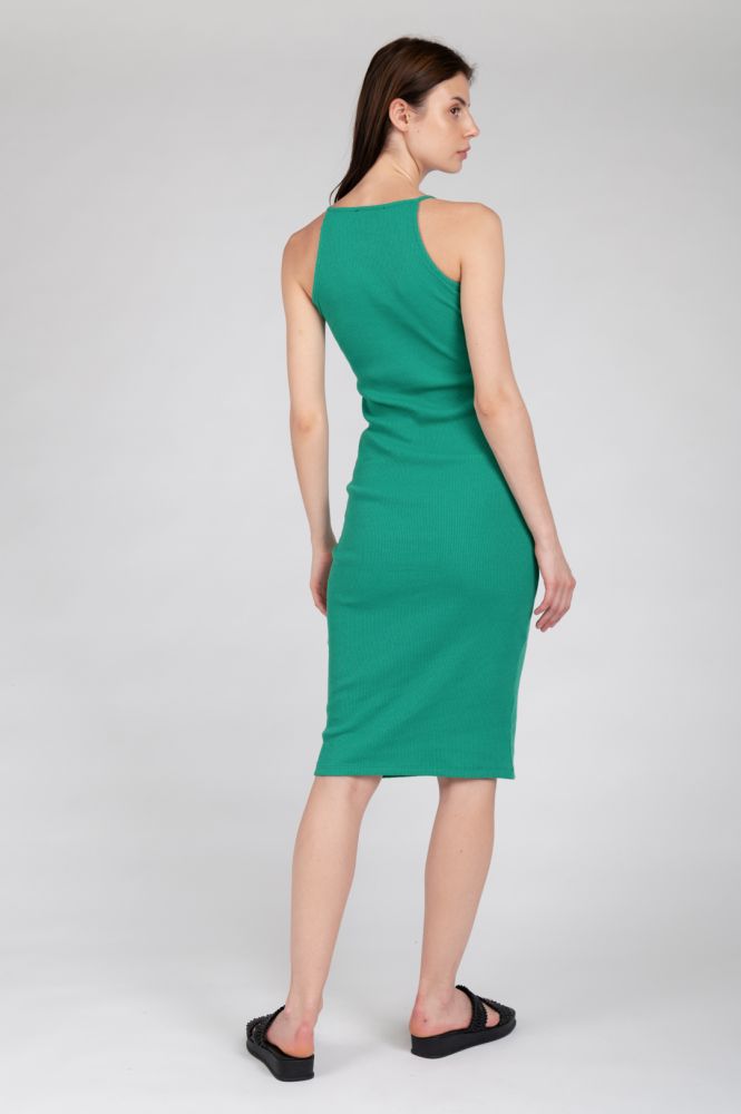 Green fitted midi dress perfect for summer events and upscale casual styling.