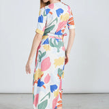 Trendy multicolor resort dress featuring modern abstract artwork print and relaxed luxury styling.