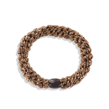 KKNEKKI Bronze Glitter. Golden-girl, Knekki hair tie in gold. Bold and joyful hairband.