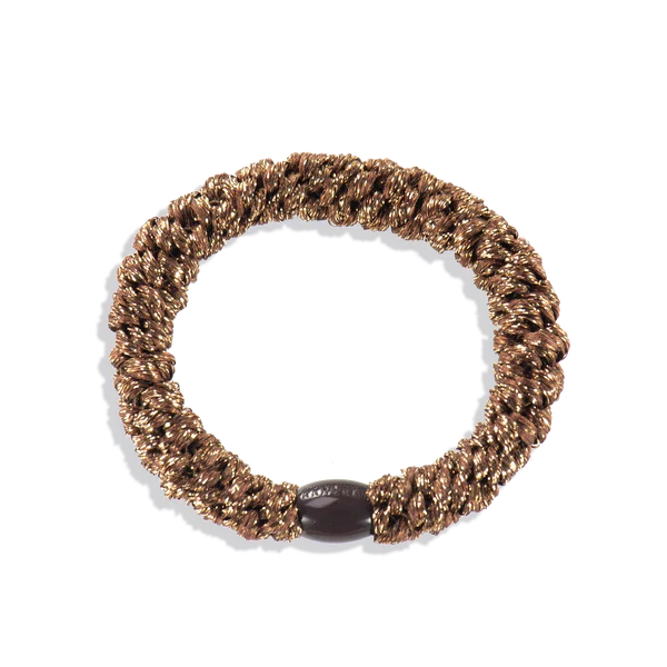 KKNEKKI Bronze Glitter. Golden-girl, Knekki hair tie in gold. Bold and joyful hairband.
