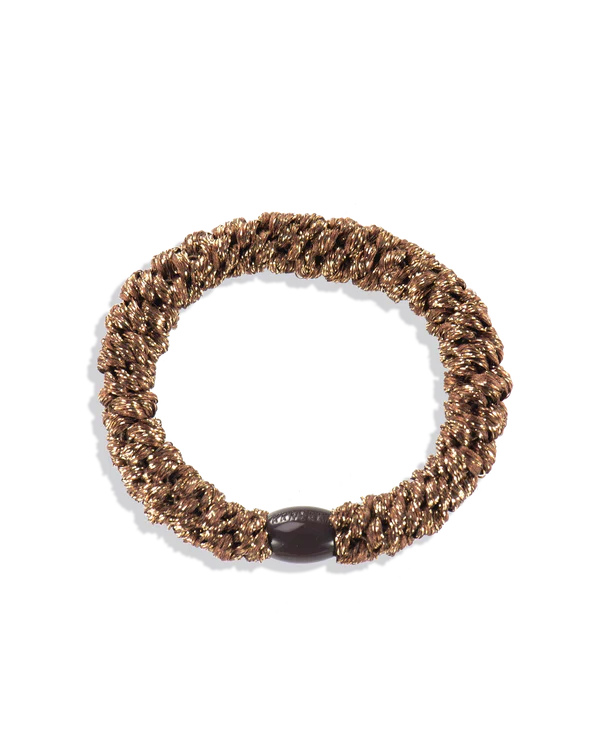 KKNEKKI Bronze Glitter. Golden-girl, Knekki hair tie in gold. Bold and joyful hairband.