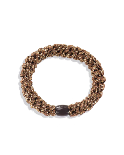 KKNEKKI Bronze Glitter. Golden-girl, Knekki hair tie in gold. Bold and joyful hairband.