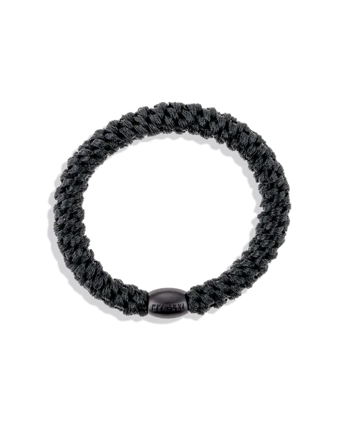 The nighttime Kknekki hair tie, sophisticated black hairband.