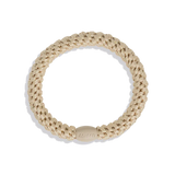 The most comfortable hair tie in olive gold with braided detailing for beachy bohemian jewelry trends.