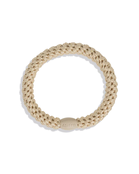The most comfortable hair tie in olive gold with braided detailing for beachy bohemian jewelry trends.