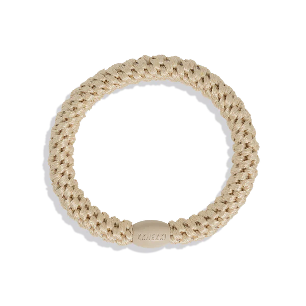 The most comfortable hair tie in olive gold with braided detailing for beachy bohemian jewelry trends.