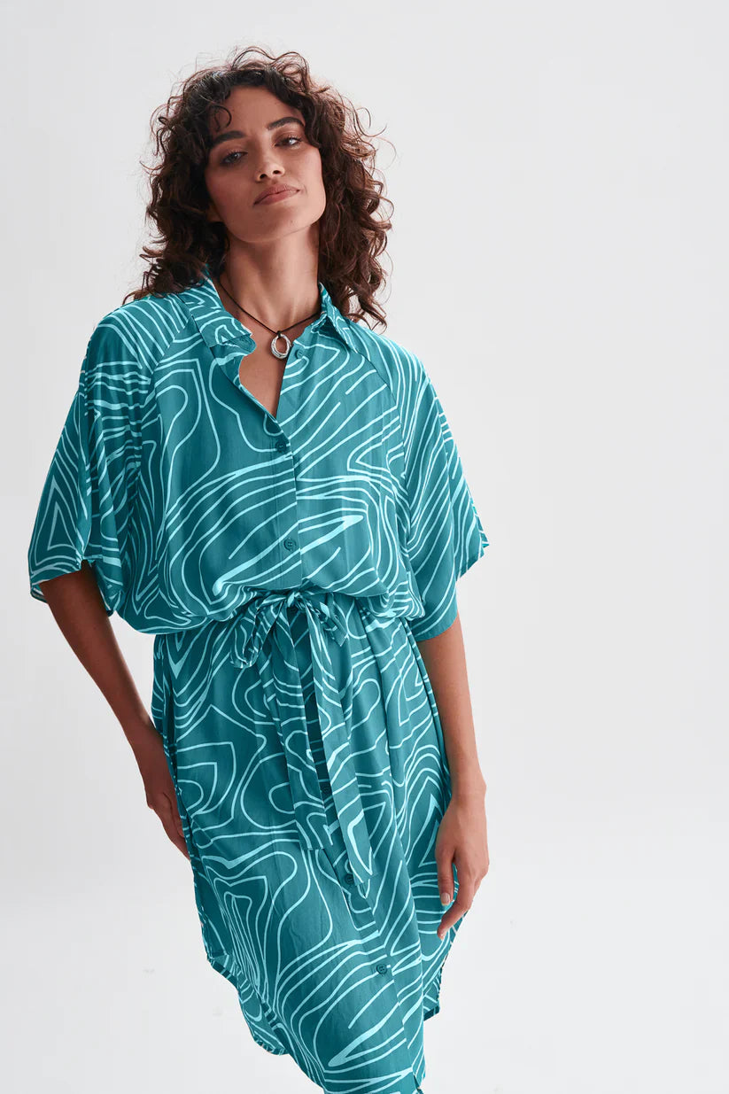 Lightweight turquoise midi shirt dress with cinched waist and oversized silhouette for beach-to-brunch styling.