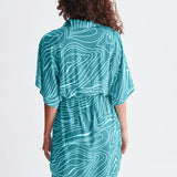 Women’s teal button-front mini dress featuring oversized fit, geometric line print, and adjustable tie waist.
