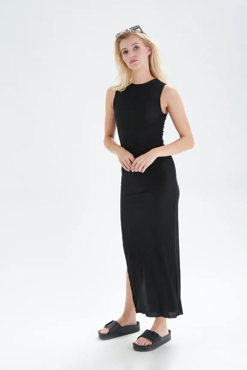 Boutique women’s sleeveless black midi dress with sleek bodycon fit and understated luxury appeal.