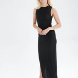 Boutique women’s sleeveless black midi dress with sleek bodycon fit and understated luxury appeal.