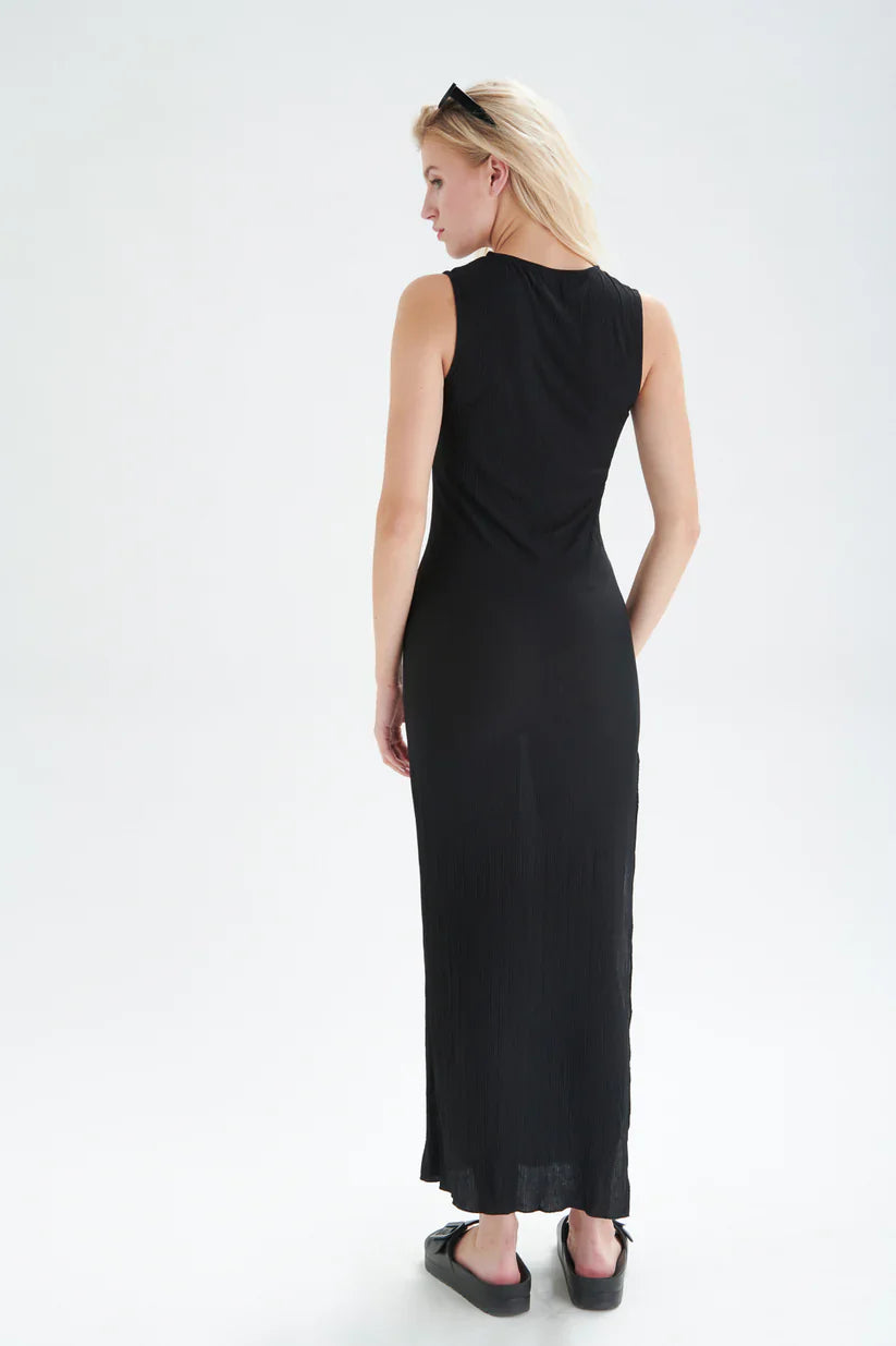 Fashion-forward black column maxi dress with modern sleeveless cut and elegant streamlined silhouette.