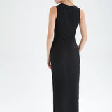 Fashion-forward black column maxi dress with modern sleeveless cut and elegant streamlined silhouette.