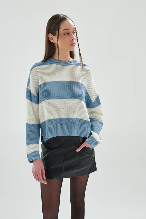 Best selling cozy oversized sweater with wide blue and cream stripes and ribbed detailing for laid-back chic everyday fashion looks.
