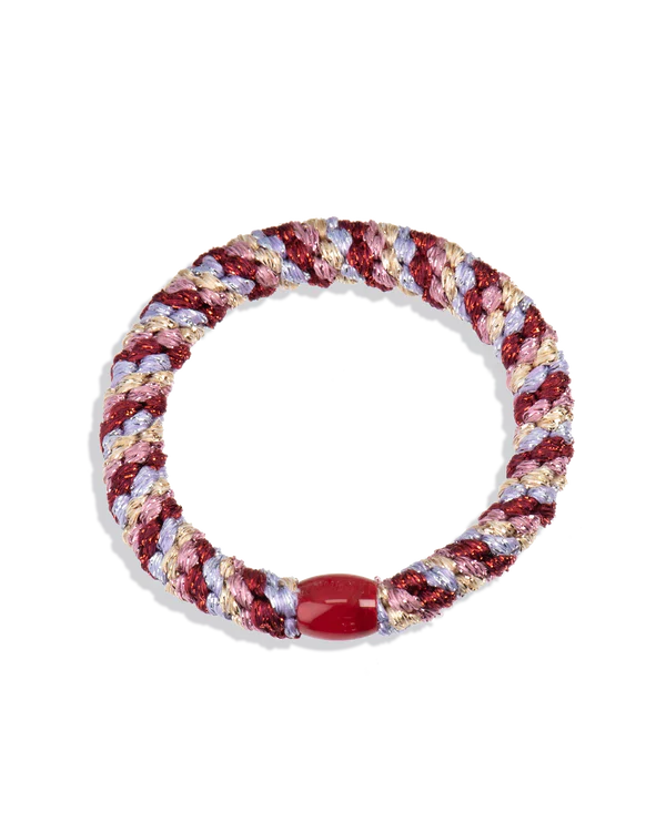 Hair chic, wear this hair tie as jewelry too around your wrist. Polyester and rubber hair tie, gentle to the hair.