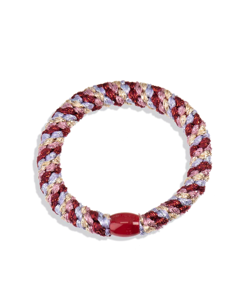 Hair chic, wear this hair tie as jewelry too around your wrist. Polyester and rubber hair tie, gentle to the hair.