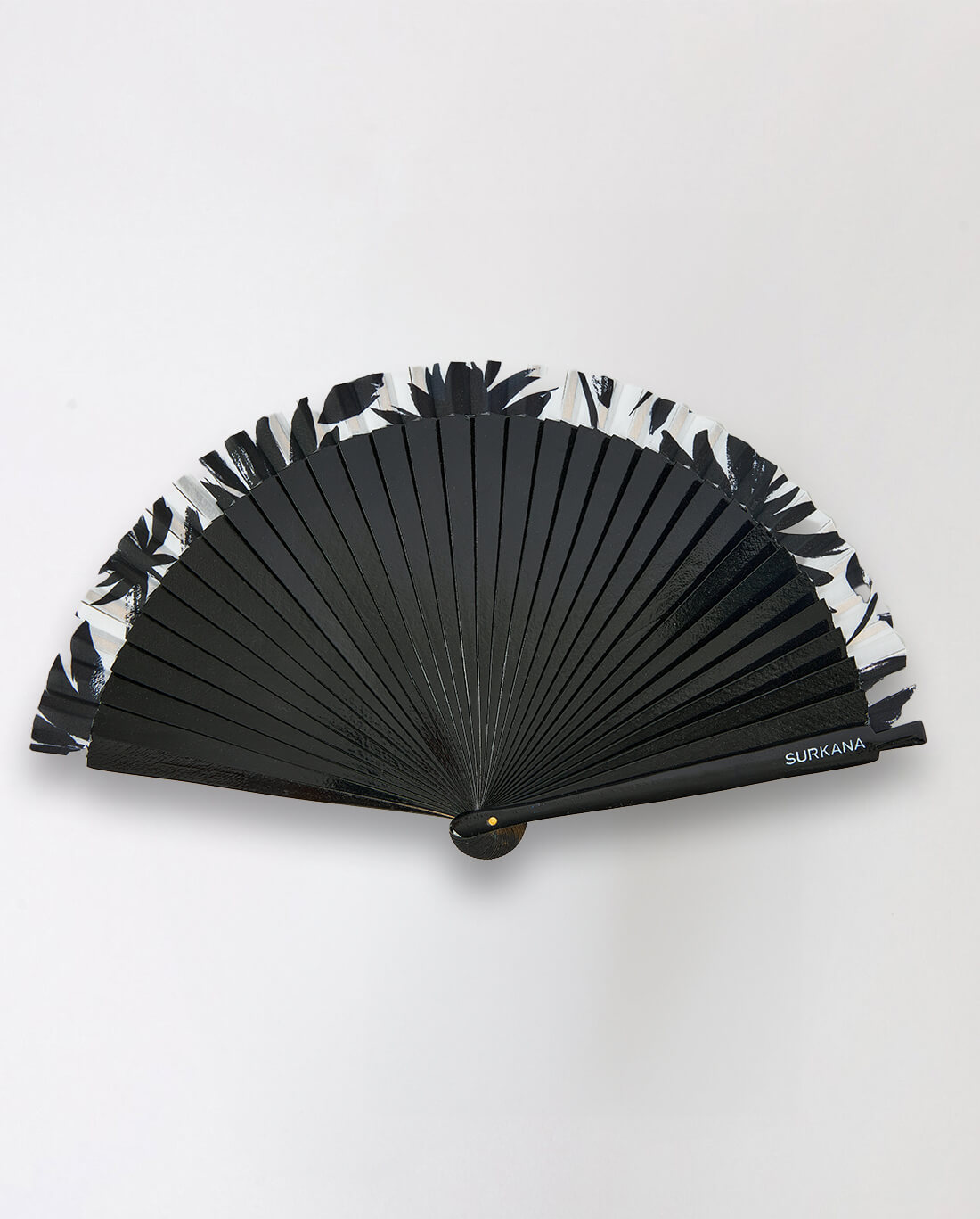 Elegant women’s black folding fan with modern boho sophistication and statement accessory appeal