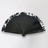 Elegant women’s black folding fan with modern boho sophistication and statement accessory appeal