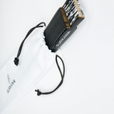 Women’s luxury-inspired folding fan accessory with timeless monochrome design and chic modern appeal.