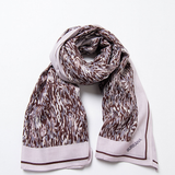 Surkana women’s abstract print scarf in brown, grey, and ivory with contrast border for stylish layering and versatile everyday outfits.