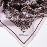 Women’s lightweight neutral print scarf by Surkana for travel, work outfits, and versatile everyday styling.