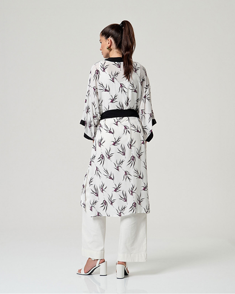 Women's statement floral kimono jacket crafted from breathable fabric for effortless summer layering and vacation wardrobes.