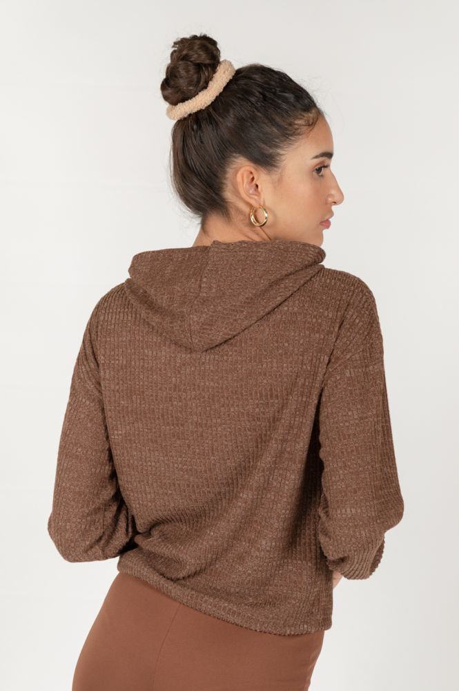 Women's textured knit hooded top perfect for fall fashion and layering.